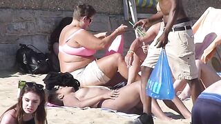 Brunette babe tanning topless her boobs and perky nipples