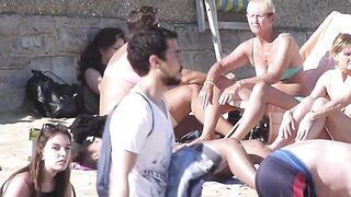 Brunette babe tanning topless her boobs and perky nipples