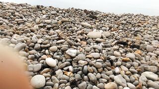 Kinky voyeur husband expose chubby wife tanning topless on rocky beach