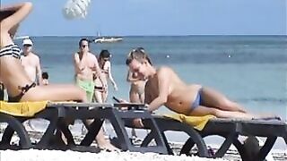 Topless German beach girls exposed tanning at Punta Cana