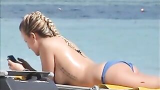 Topless German beach girls exposed tanning at Punta Cana