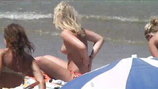 Beach Girls topless tanning