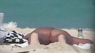 Hidden camera taping beach nudists exposing their naked bodies