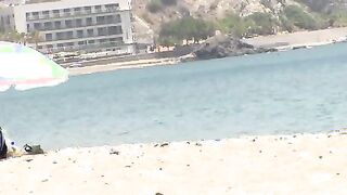 Nude beach topless girls tanning