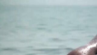 Beach girls tanning in the sun