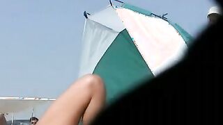 Totally naked teenager on spy beach