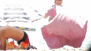 Nude beach wife exposing her hairy pussy