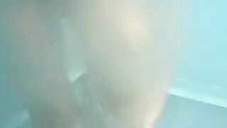 Nude girls caught by spy cam on beach shower cabin