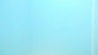 Nude girls caught by spy cam on beach shower cabin