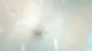 Nude girls caught by spy cam on beach shower cabin