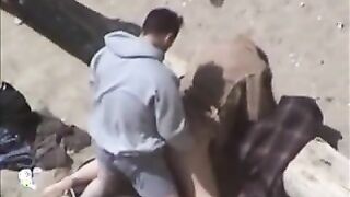 Couple having sex on the beach