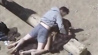 Couple having sex on the beach