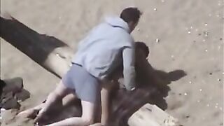 Couple having sex on the beach