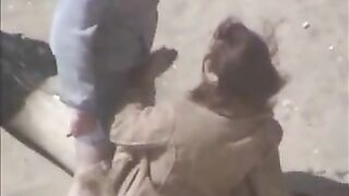 Couple having sex on the beach