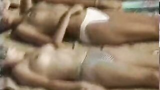 Row Of Exposed Titties On The Beach