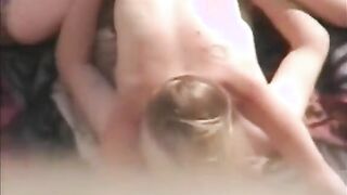 Voyeur camera finds nude beach couple fucking