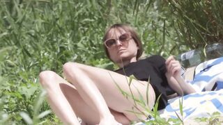 Big tits fit milf going naked on the beach