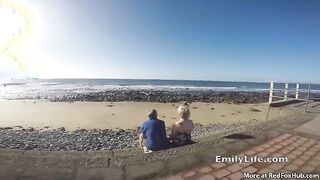 Big ass blonde is having sex on the beach, with many horny guys at the same time